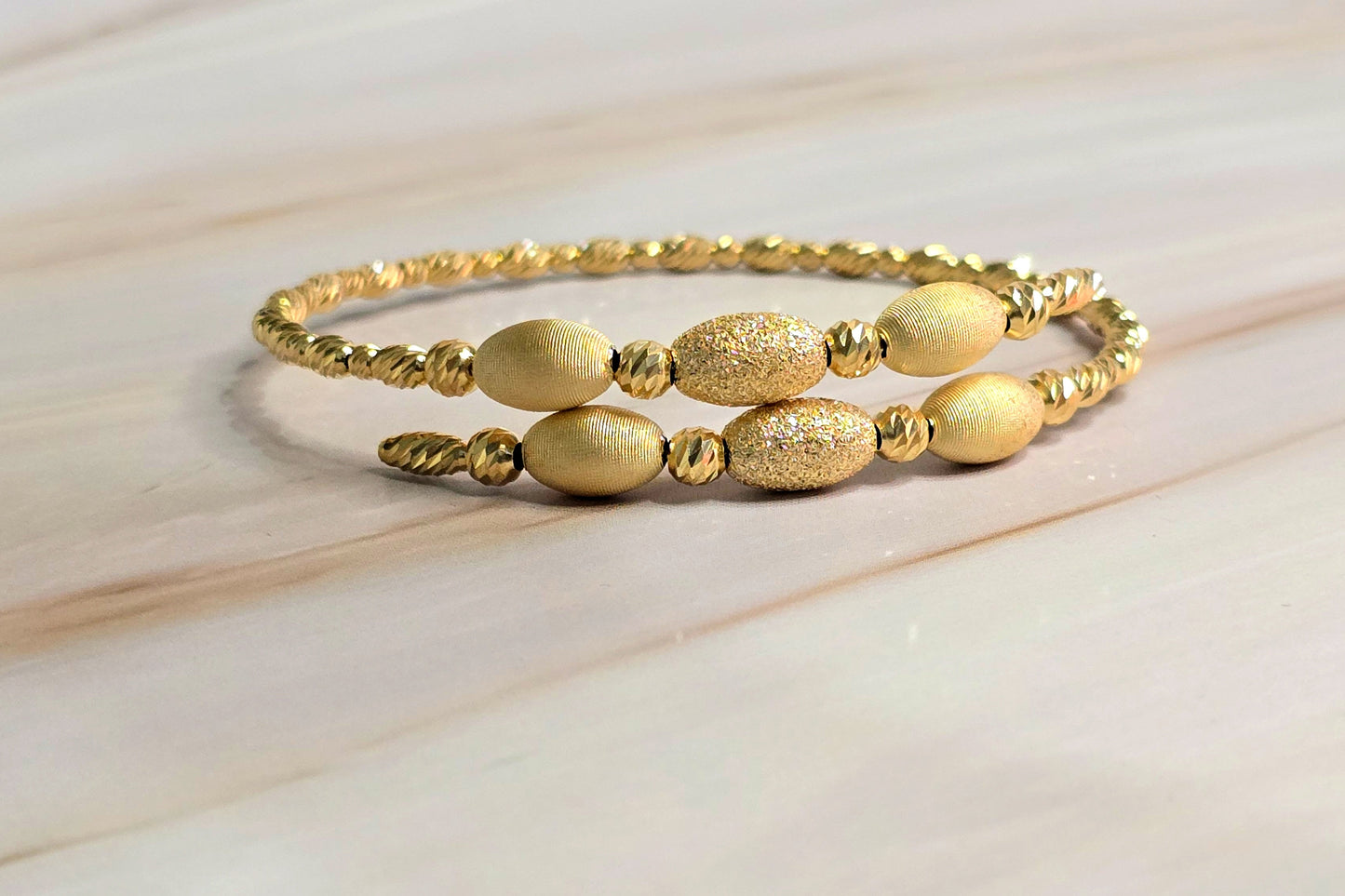 Twisted Rope Bangle — Oval Bead Accent in Gold-Plated Silver