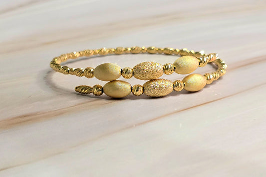 Twisted Rope Bangle — Oval Bead Accent in Gold-Plated Silver