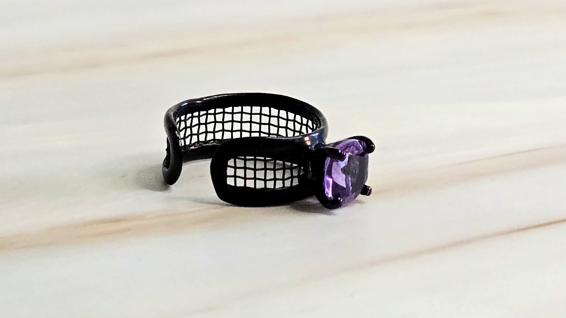 Mistral anthracite plated sterling silver 925 ring with natural amethyst and titanium mesh by German Kabirski - front view