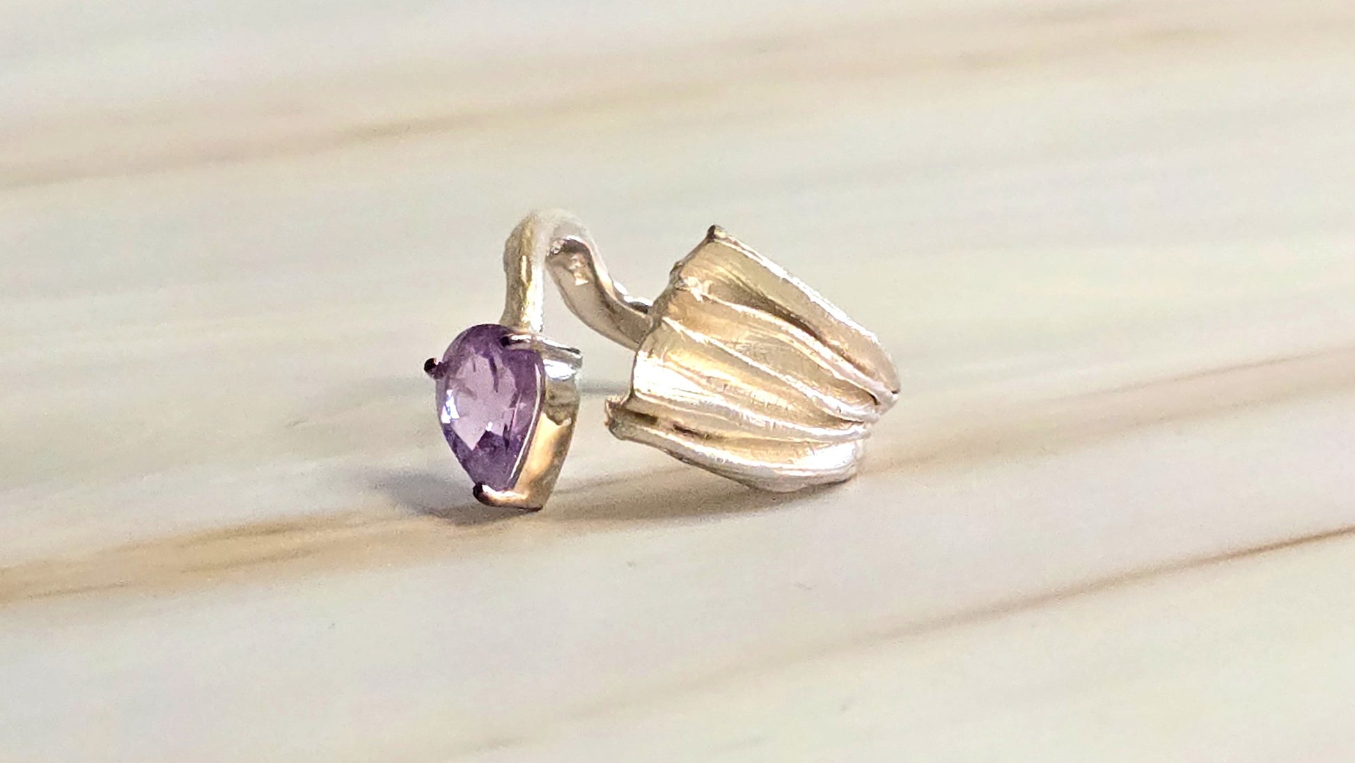 Alecto open band sterling silver 925 ring with pear cut natural amethyst by German Kabirski - side view showing textured end